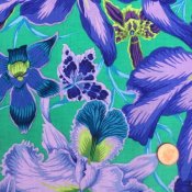Grön,blå,lila tyg med stora blommor