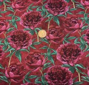 Vinrött tyg med blommor