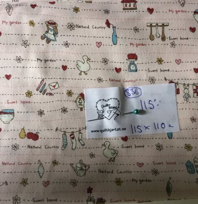 Rosa tyg med små motiv