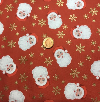 Rött tyg med tomtar
