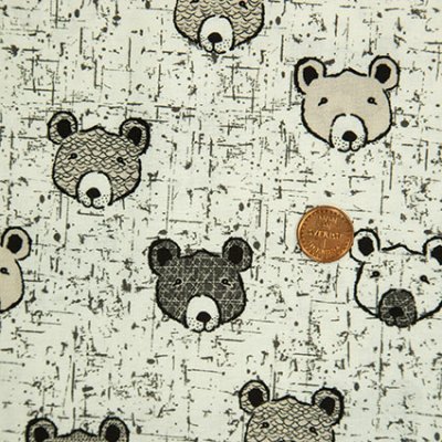 Ljust tyg med björnar i olika grå färger
