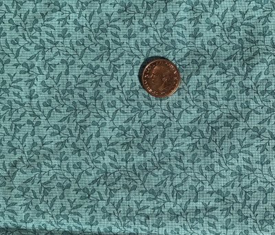 Ljus petrolimblå med blad