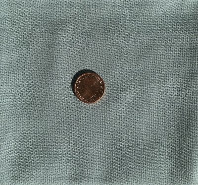 Bas Petits Points gråblått tyg med små prickar