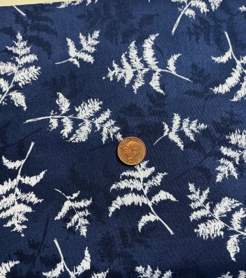 Mörkblått tyg med blad