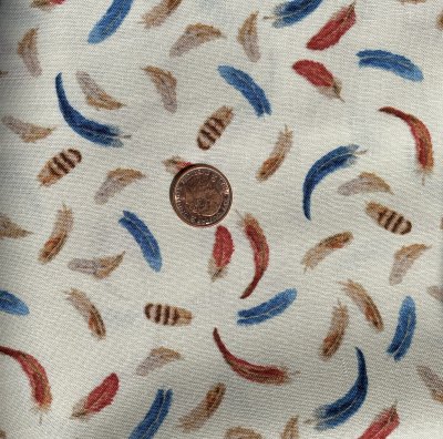 Beige tyg med fjädrar