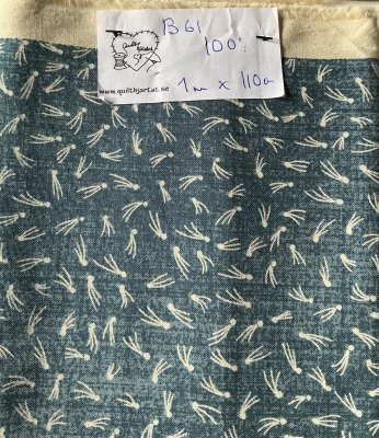 Blått tyg med ljust mönster