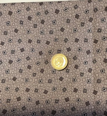 Beigegrått tyg med mini rutor med prickar