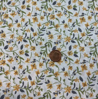 Ljust tyg med små blommor och blad